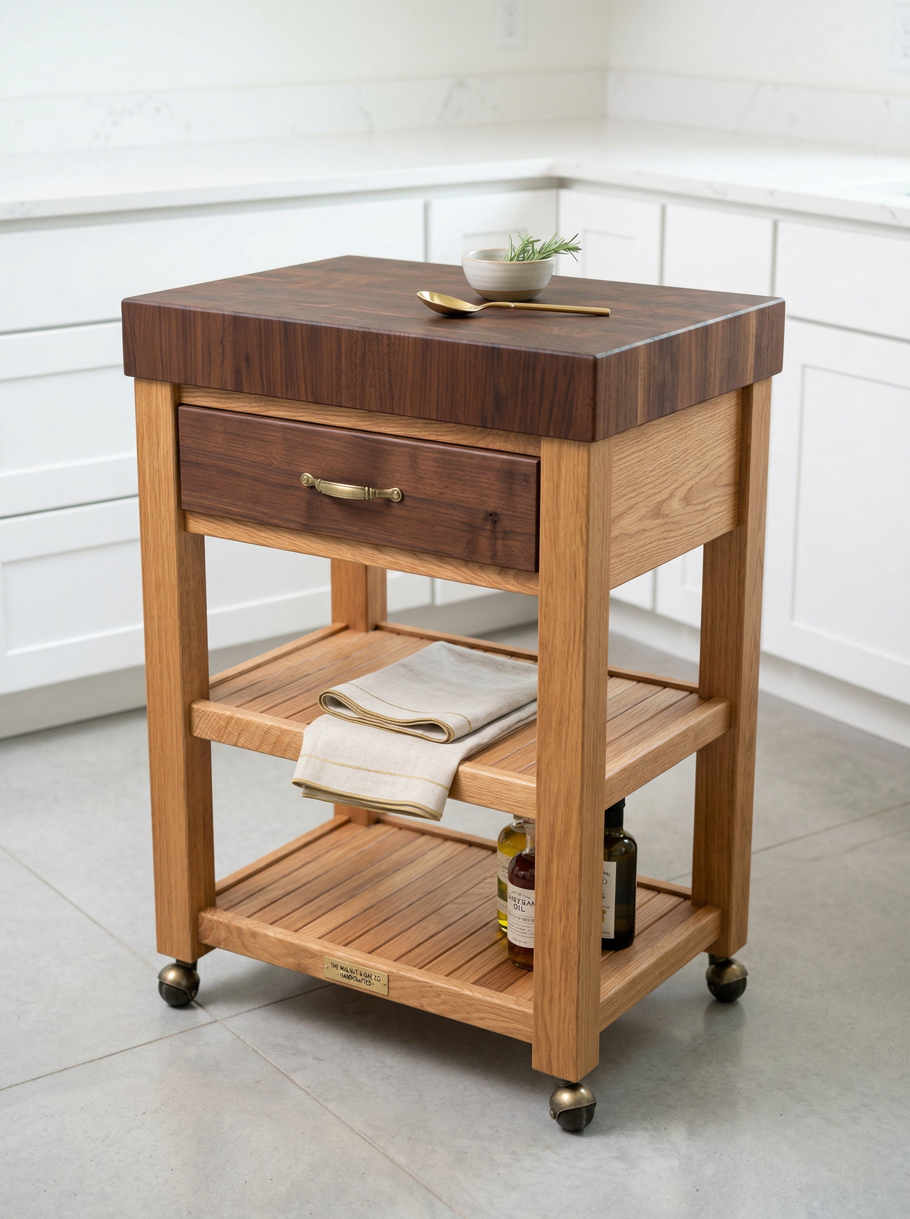 Butcher block kitchen cart with walnut top and brass casters